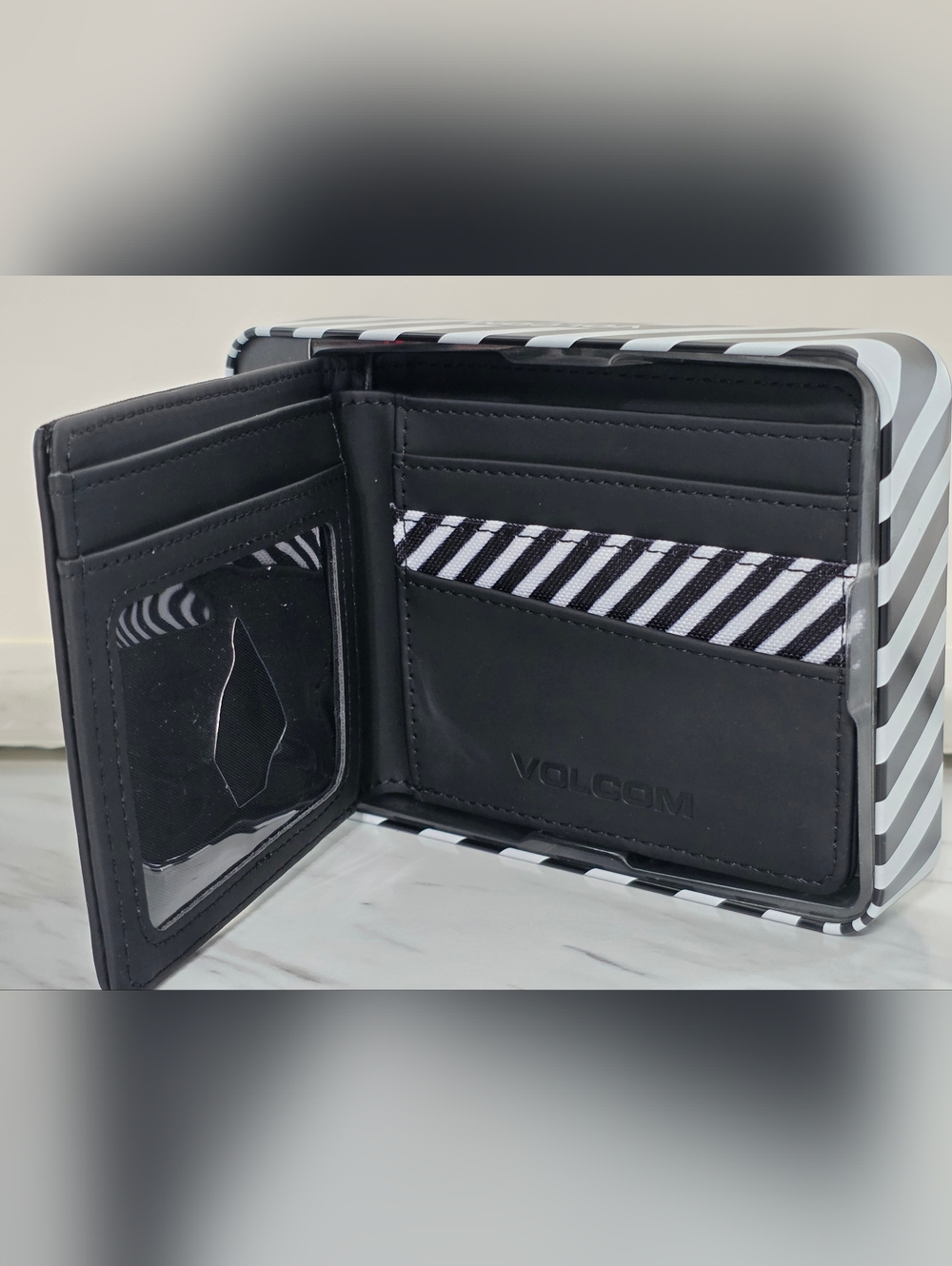 Volcom Black Bifold Wallet with Black & White Stripe Accent